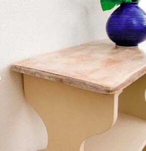 nightstand painted in tan clay furniture paint and finished on the top with white liming wax