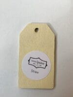 Small wooden tag hand painted with light yellow clay furniture paint