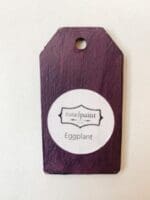 Small wooden tag hand painted with deep purple clay furniture paint