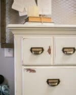 large dresser and mirror frame painted with creamy off-white paint color