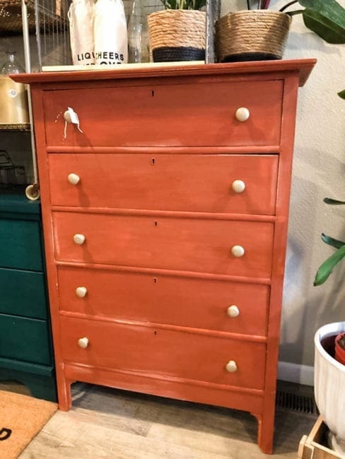 large cabinet painted with rust and orange brown clay furniture paint