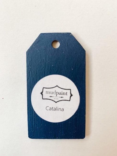 Small wooden tag hand painted with catalina clay paint
