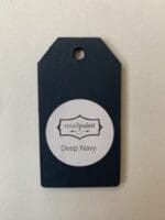 Small wooden tag hand painted with dark navy clay furniture paint