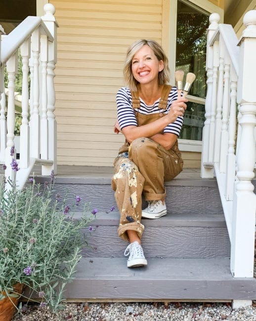 company owner and founder of Mudpaint clay furniture paint sitting on a front porch