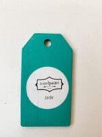 Small wooden tag hand painted with jade clay paint