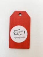 Small wooden tag hand painted with red clay furniture paint