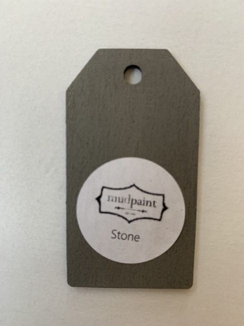 Small wooden tag hand painted with gray brown clay furniture paint