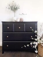 large dresser and chest of drawers that has been painted with MudPaint black clay furniture paint