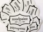 assortment of mudpaint branded stickers