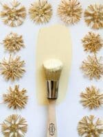 small brush painted in light yellow mudpaint clay furntiure paint