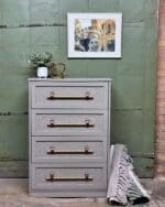 dresser painted in light gray clay furniture paint