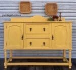 dresser painted in dark yellow clay furniture paint