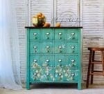 Decorative dresser with floral overlays painted in grassy green bright green clay furniture paint by MudPaint