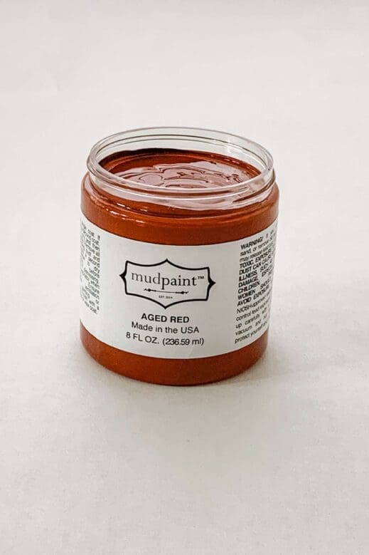8 oz container of dark red clay furniture paint from MudPaint