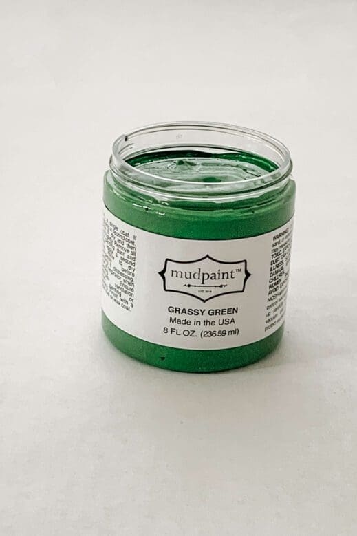 8 oz container of bright grassy green clay paint by MudPaint