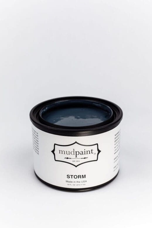 pint container of steel gray clay furniture paint storm
