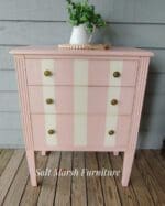 small bedroom chest of drawers painted in white and pink clay furniture paint by MudPaint