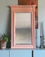 large framed rectangular mirror painted in peachy orange clay furniture paint by MudPaint