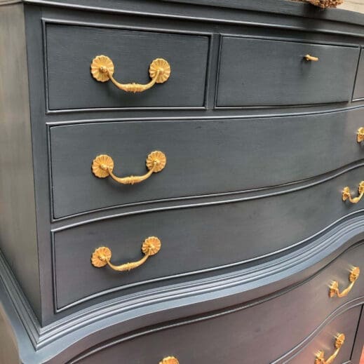 Large dresser cabinet with gold plated hardware and painted in steel blue storm clay furniture paint by MudPaint