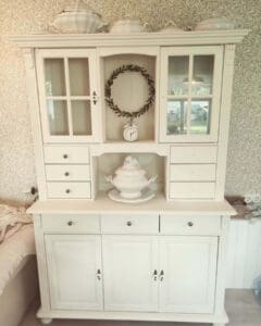 Large kitchen cabinet and hutch painted in manor white clay furniture paint by mudpaint