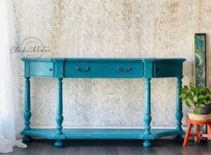 elegant multi-angled end table painted in harbor blue clay furniture paint by MudPaint